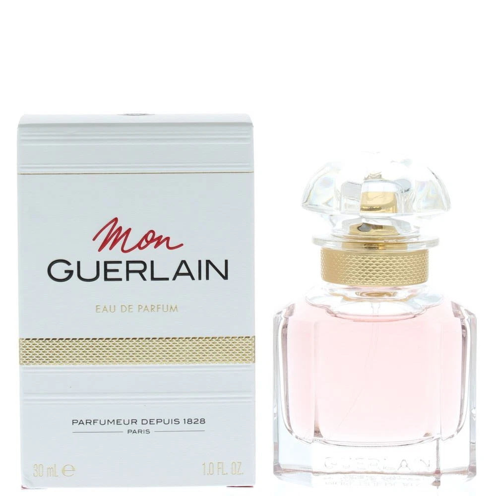 Guerlain perfume bottle and packaging on a white background
